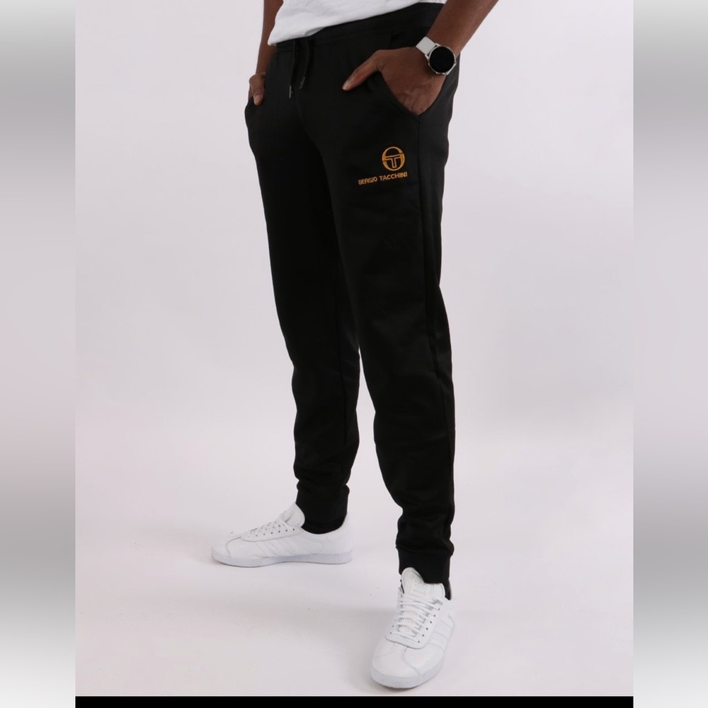 Sergio Tacchini Track Pants Black/Gold
XL, Brand New with tags, Never worn